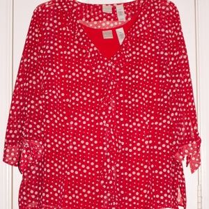 Red ruffled shirt with white and black dots